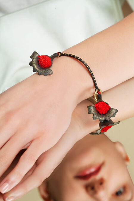Flowers engraved bronze bracelet with red tassels gallery 1